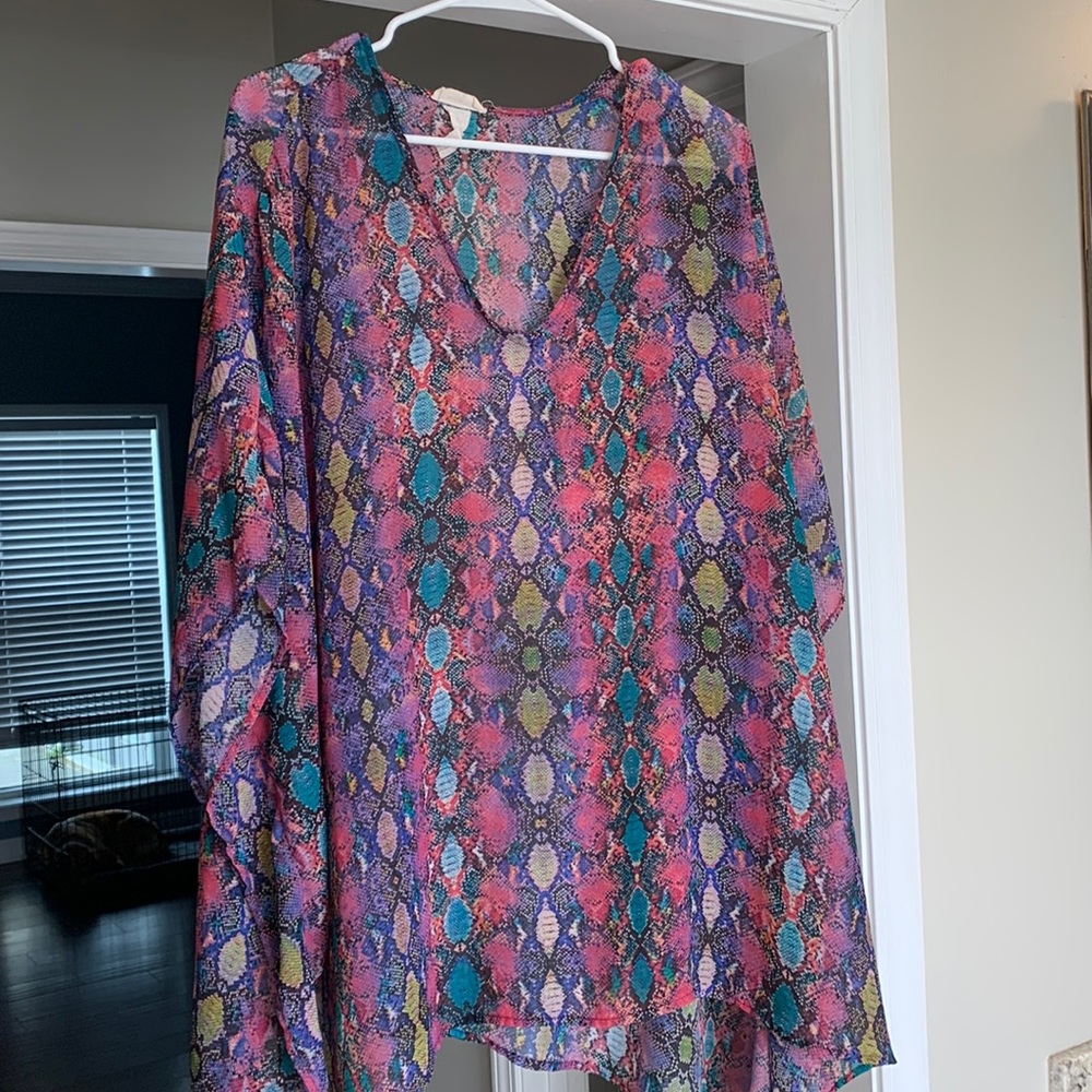 Adrienne top size large. Snake print. Loose flowy fit.